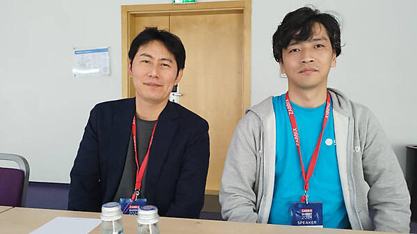 トヨタ自動車の大野充裕氏（左）とSRA OSSの赤松俊弘氏（右）