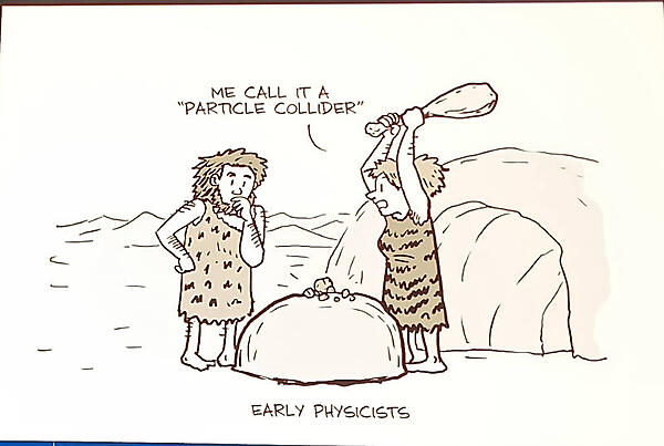 原始人が石を砕くイラストを使って「これが素粒子衝突器の始まり」と説明